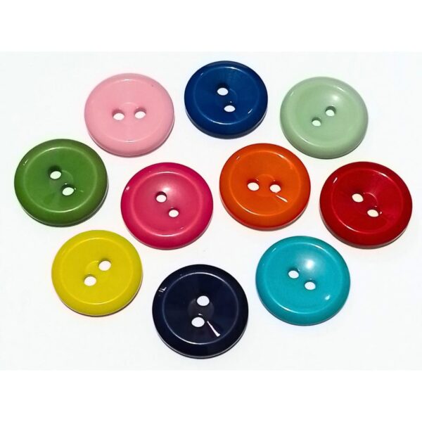 Botones de 24mm.